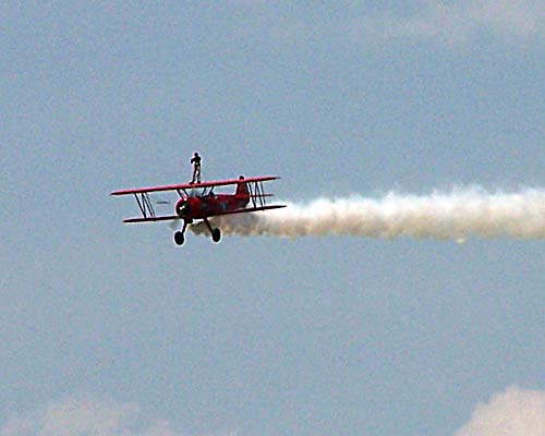 2008 Geneseo Airshow - Canadian female wing-walker Carol Pilon of Quebec - in the air walking on the wing