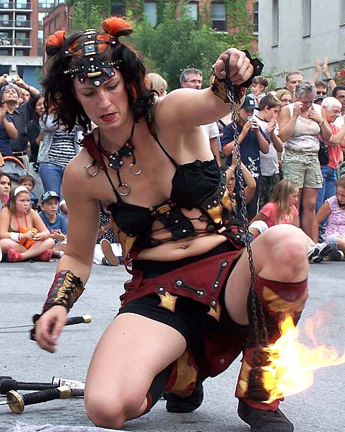 Les Walkyries member with her flaming chain at the 2007 Toronto Buskerfest