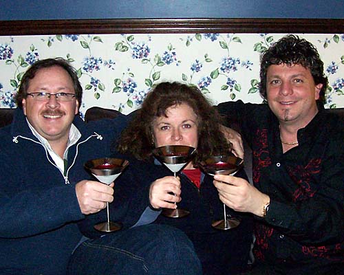 James Hamilton, Ann Hamilton, Martino Tulino enjoy a cocktail