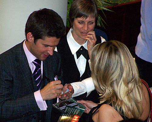 Singer Matt Dusk signs autographs after a great performance