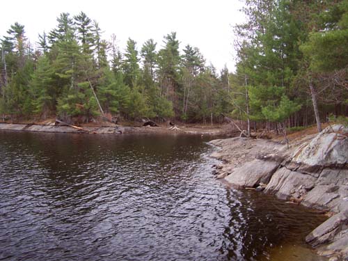 The back bay of the Swift Rapids Dam is kept low during draining of the spring melt