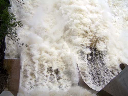 water pounds down the spillway of the Swift Rapids Dam