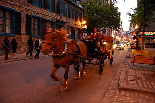 Old Quebec City, Quebec. A horse drawn carriage makes it's way through the narrow streets