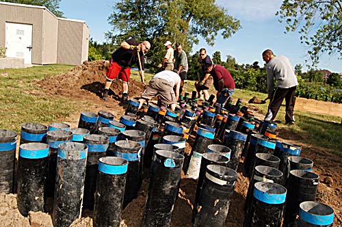 Acton's 2008 Canada Day celebrations - Acton Firefighters Association setting up the fireworks in Prospect Park - mortar tubes dug into the ground