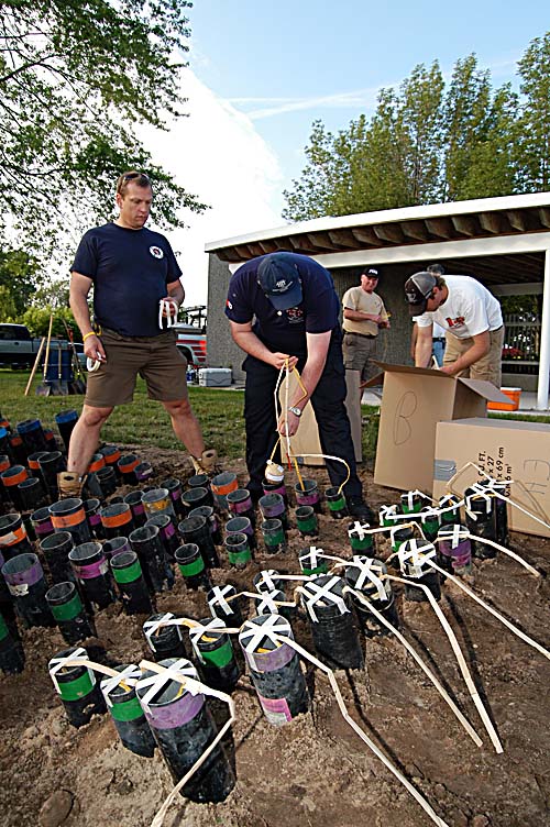 Acton's 2008 Canada Day celebrations - Acton Firefighters Association setting up the fireworks in Prospect Park - fireworks are placed into the mortar tubes