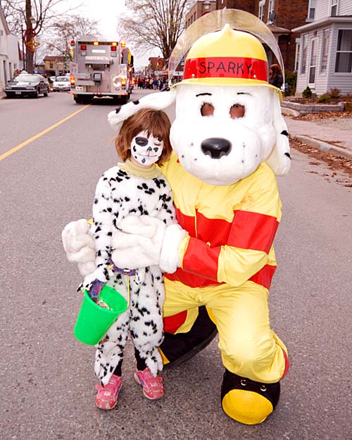 Acton 2007 Santa Claus Parade. Sparky the mascot with a little dalmation.