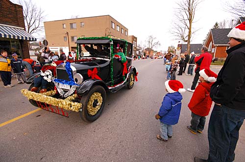 Acton 2007 Santa Claus Parade. Antique car is part of the parade