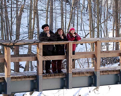 Joe, Erin and Ann on a bridge over a creek in Tiffany Falls Conservation Area, Hamilton, Ontario