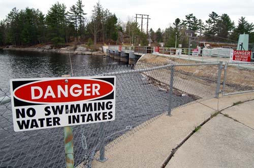 No swimming sign upstream of the Swift Rapids Dam