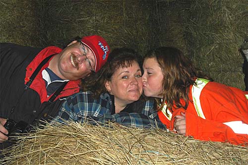 James, Ann and Erin by the hay bales at the Armstrong's Farm near Orillia, Ontario