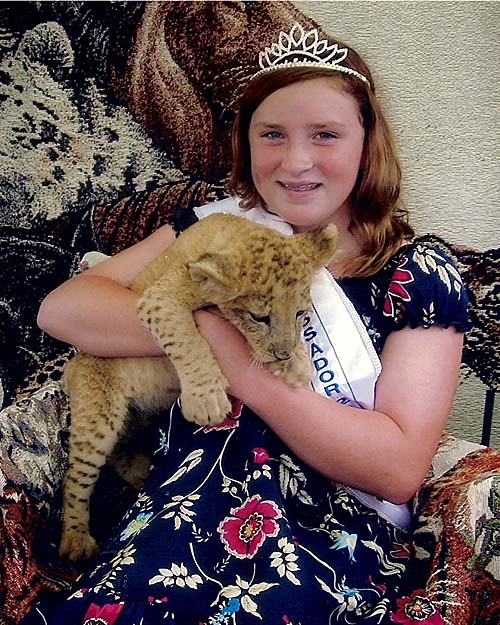 Erin with TJ the lion cub