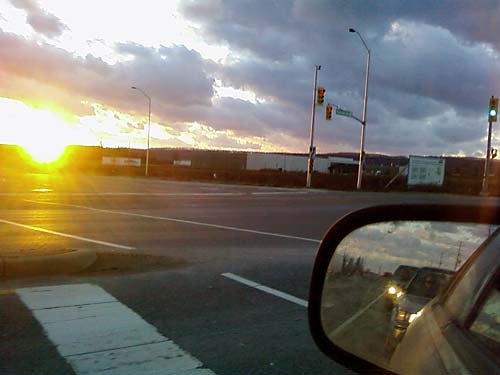 Sunset over the Niagara Escarpment while driving on Highway 25 in Milton, Ontario