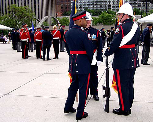 Honour guards for the DDay anniversary event gather at Nathan Phillips Square, City Hall, Toronto.