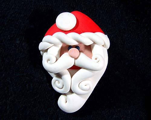 Santa Claus pin by artist Ann Hamilton